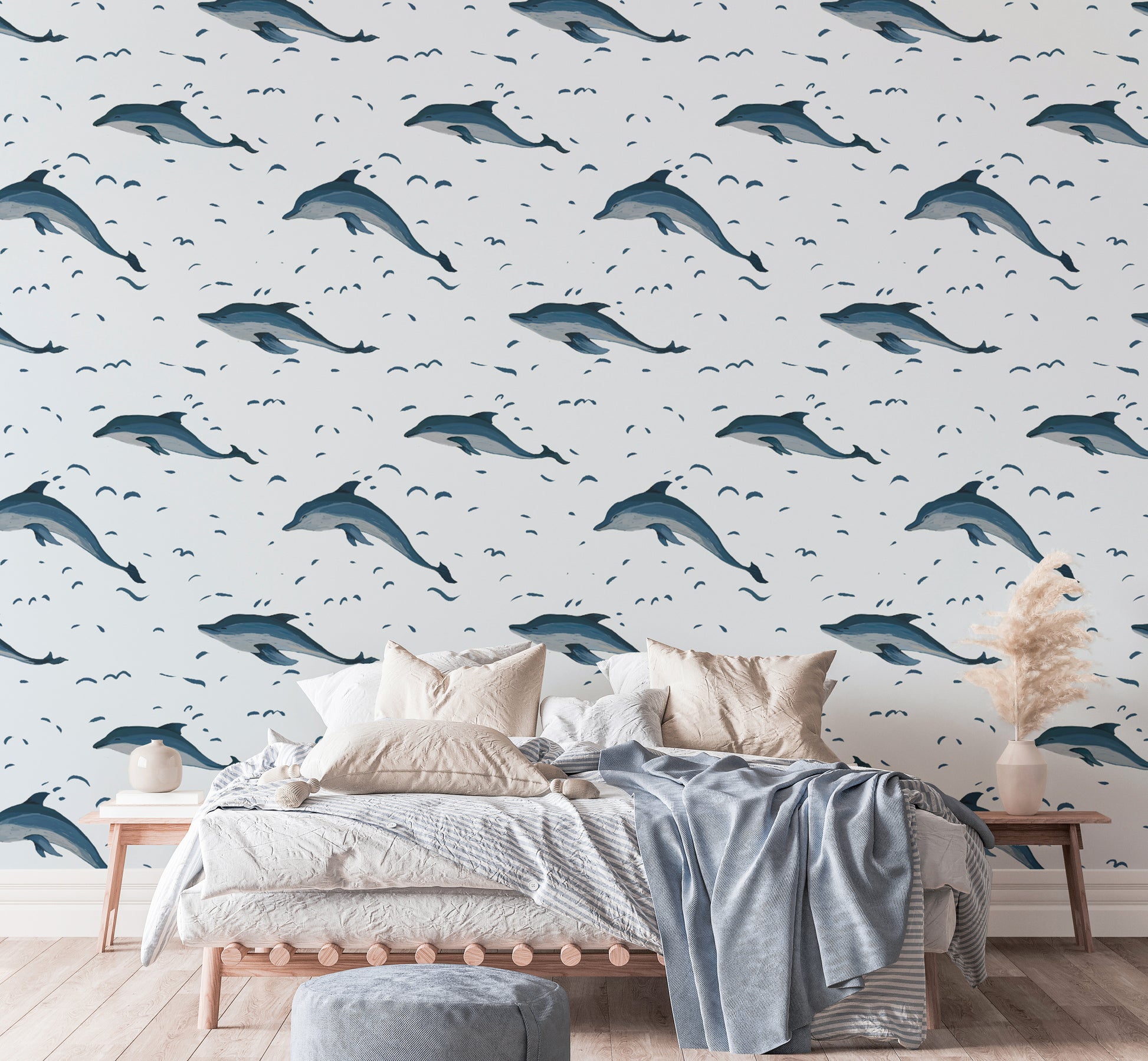 Playful dolphins in the sea wallpaper for ocean-inspired decor.
