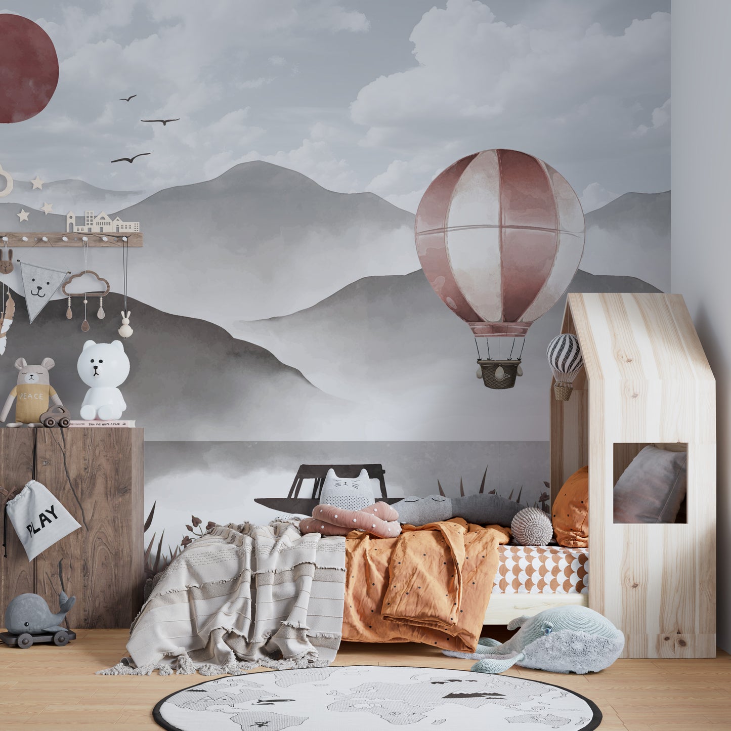 Soaring above misty peaks in a hot air balloon mural