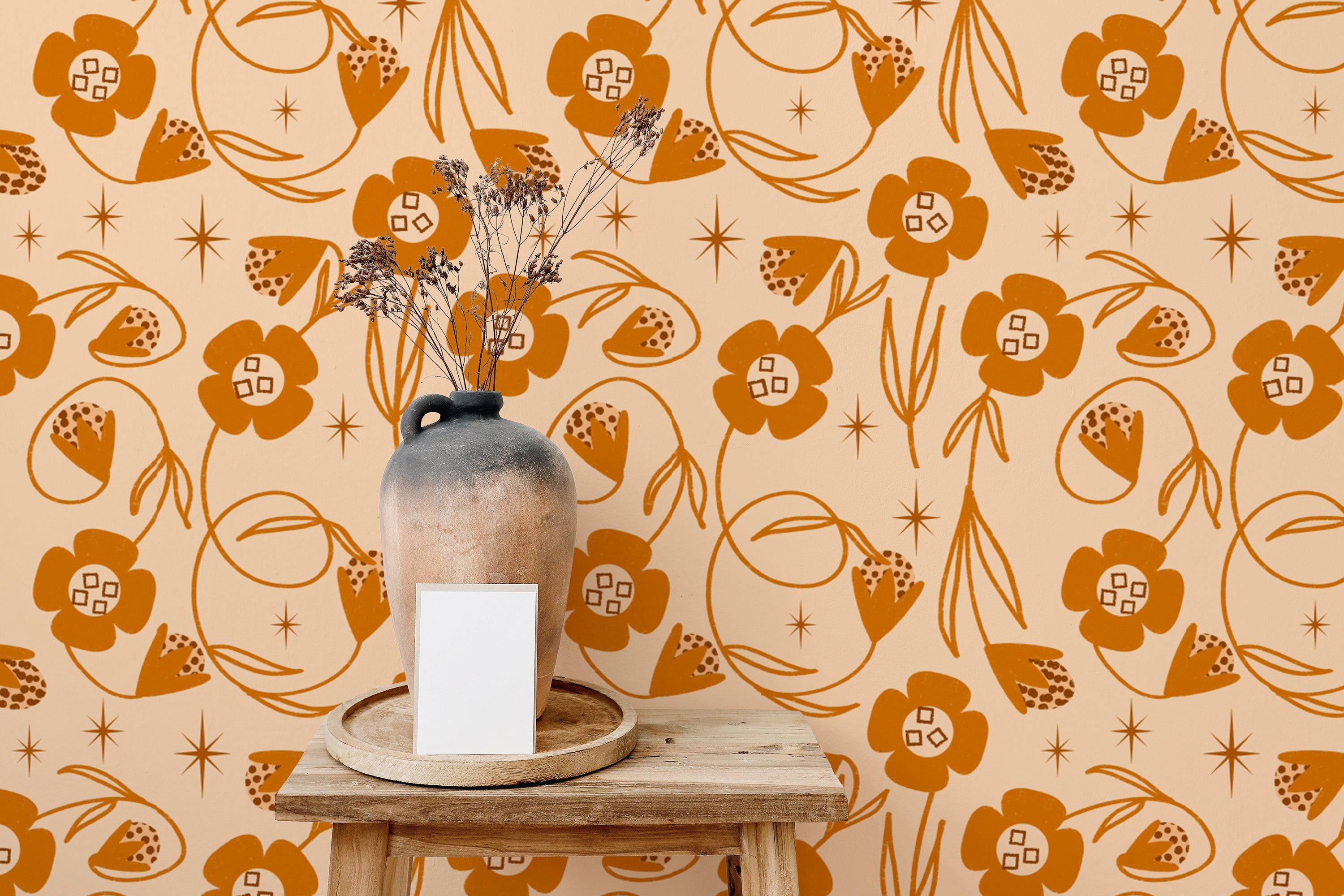 Peach and orange mural with floral design
