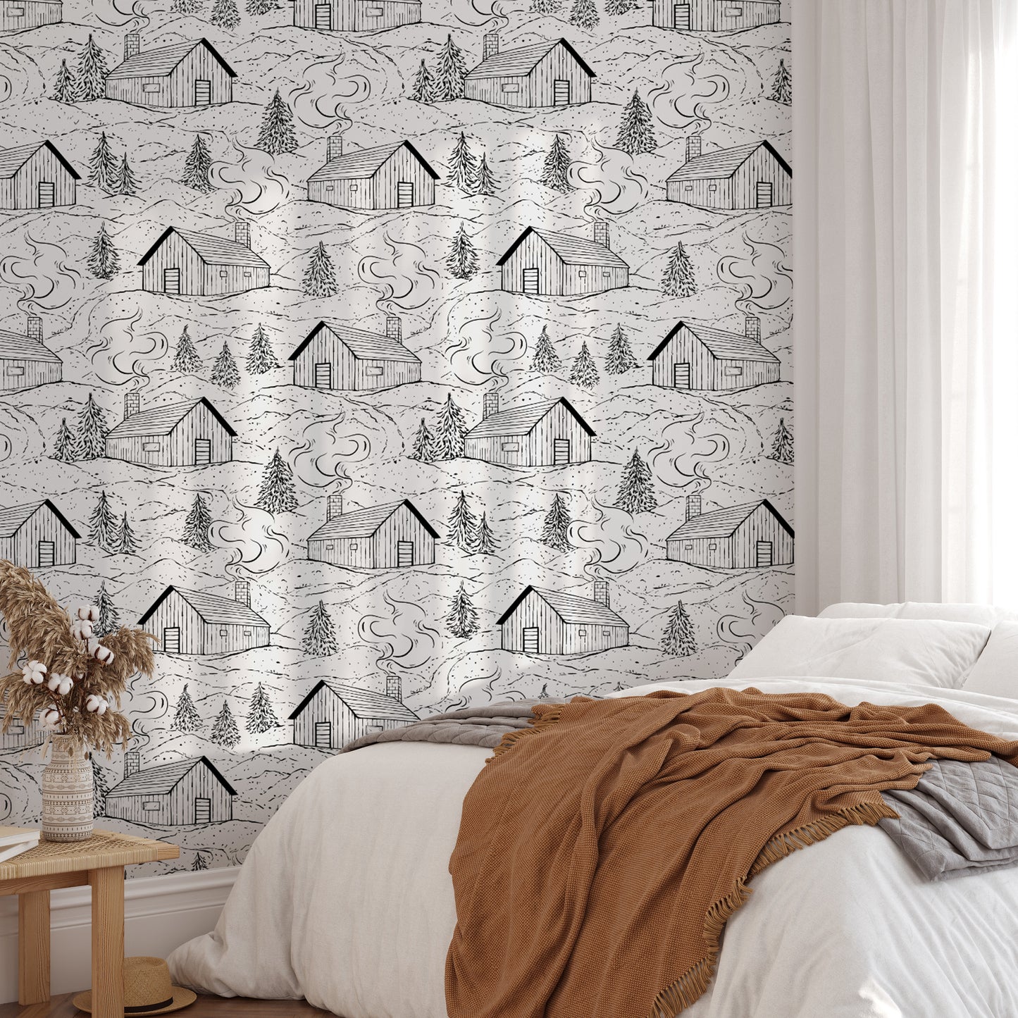 Nature-inspired black and white cabin mural for a serene ambiance.
