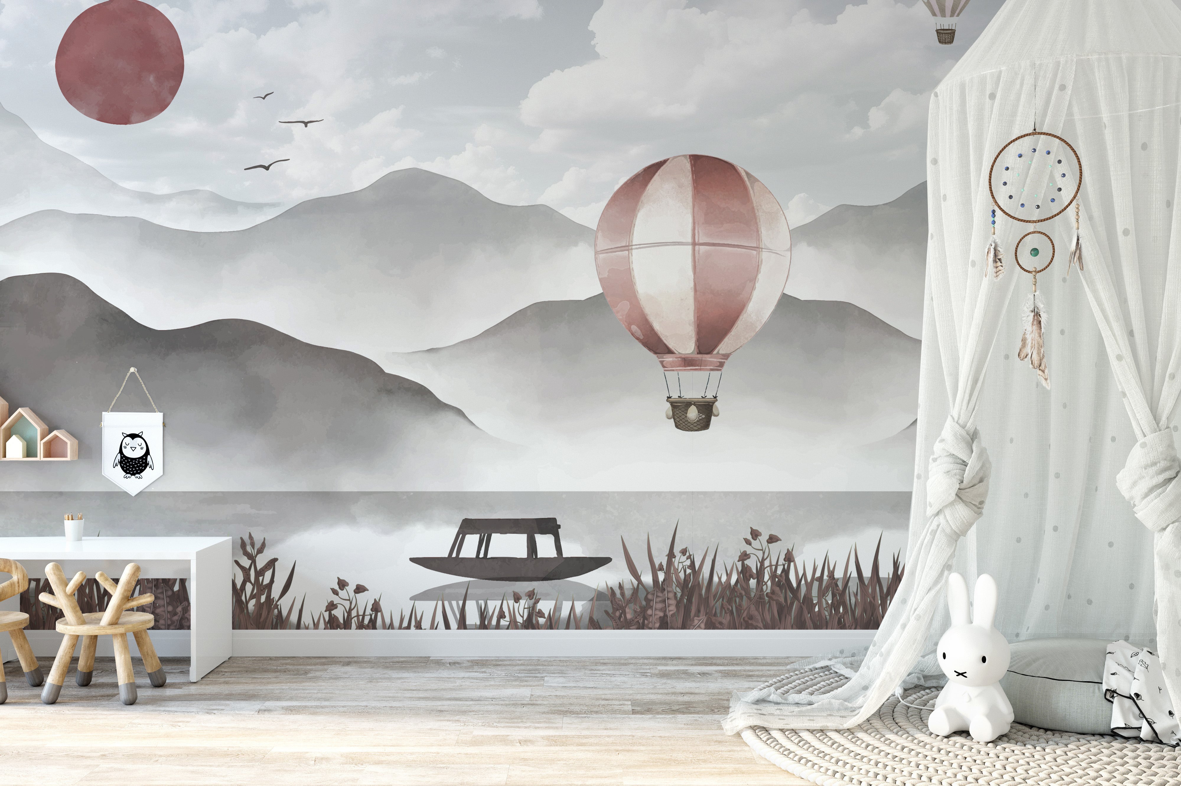 Dreamy misty peaks wallpaper with a hot air balloon scene