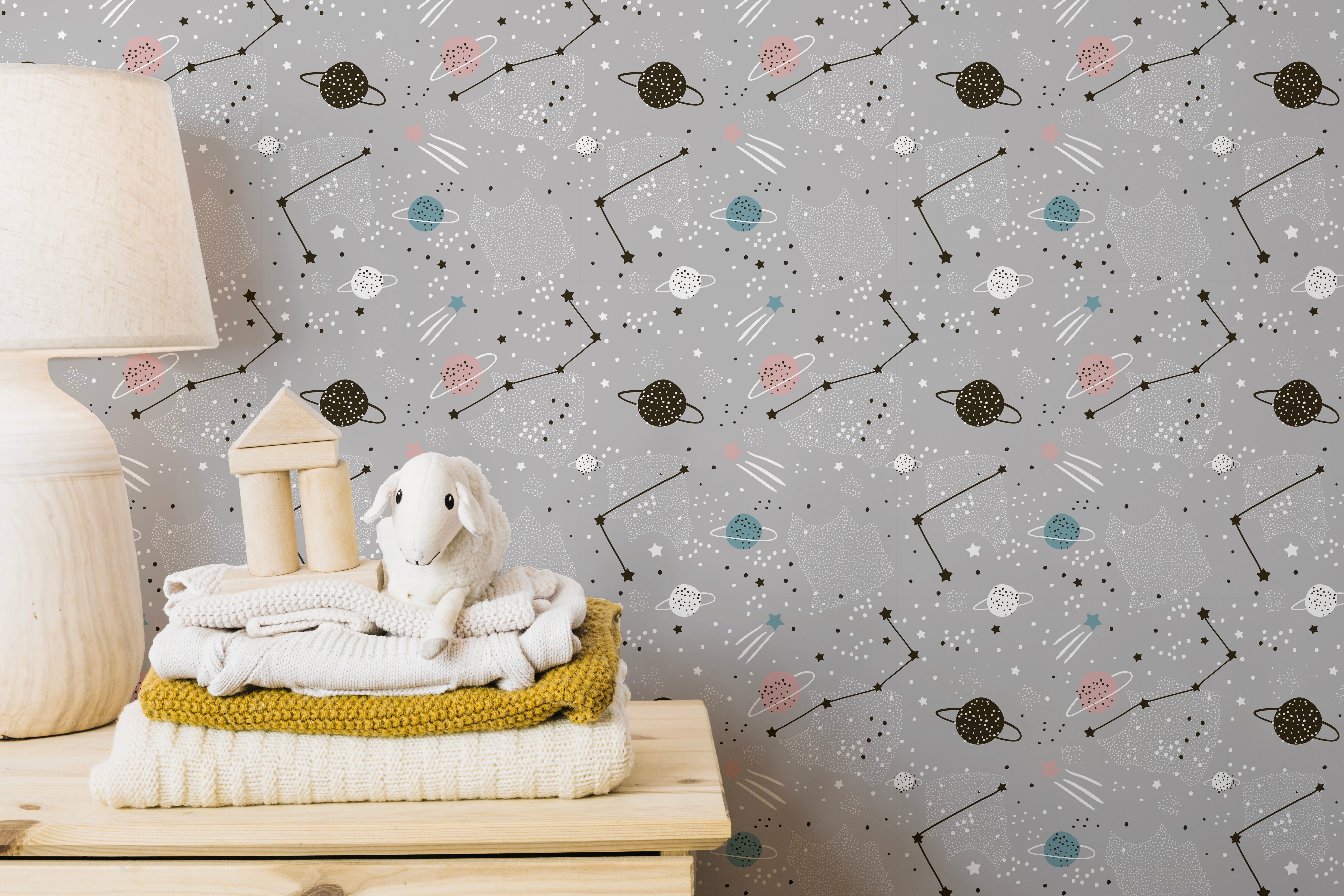 Playful stars and planets mural wallpaper
