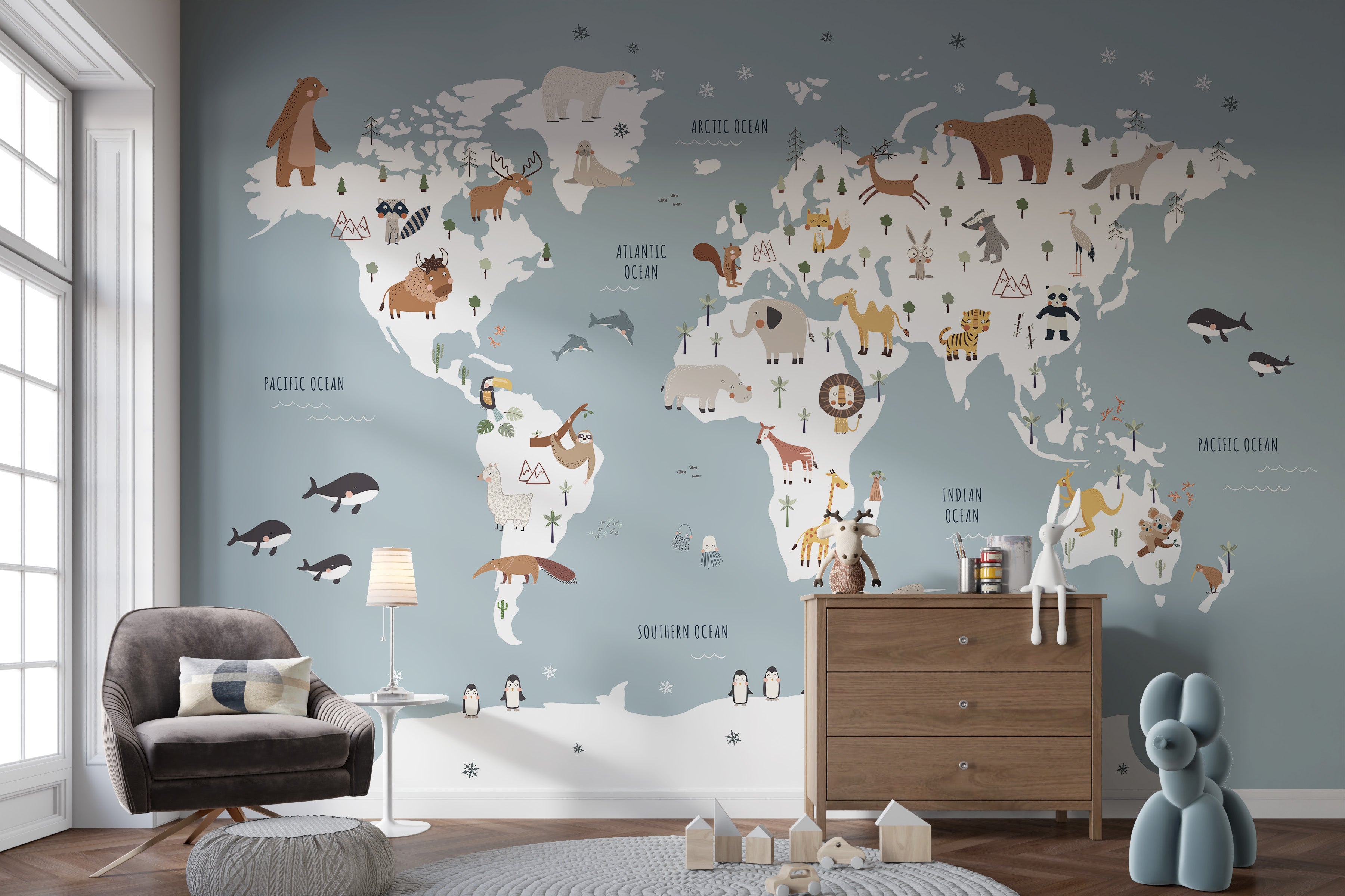 Kids room blue map wallpaper featuring wildlife
