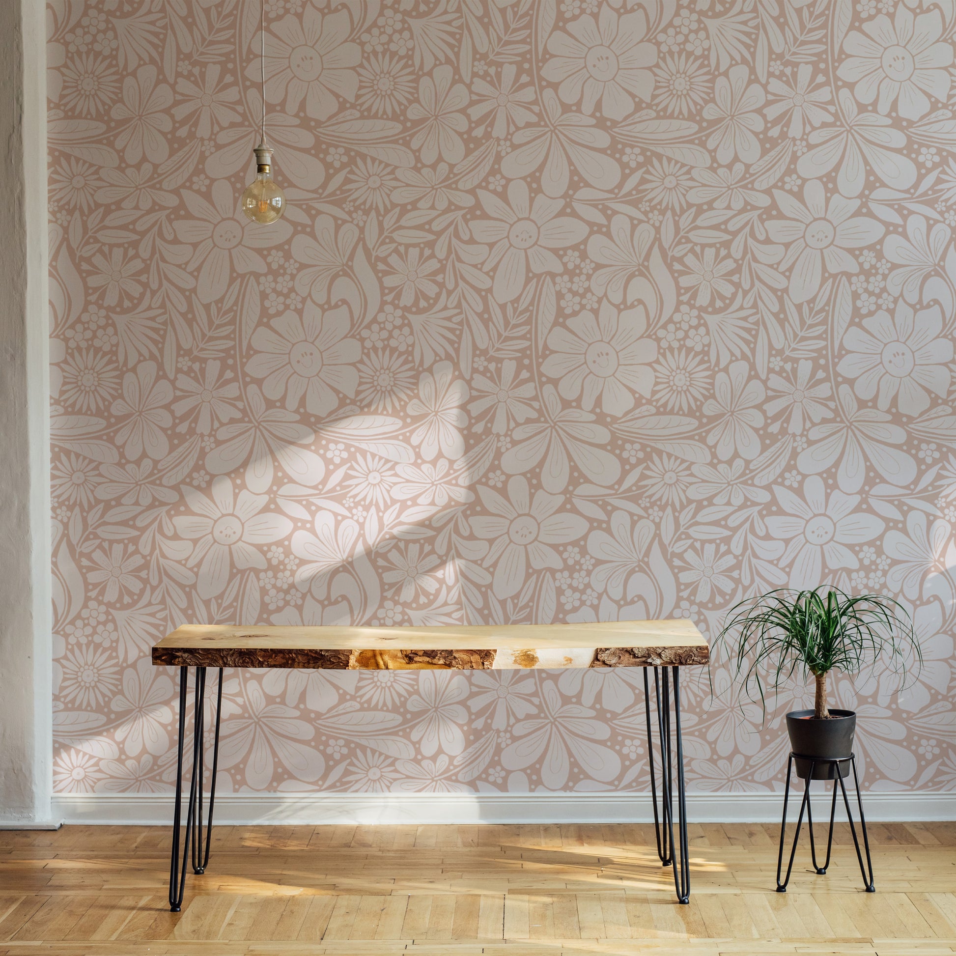 Minimalist pastel pink wallpaper with playful happy bloom patterns.
