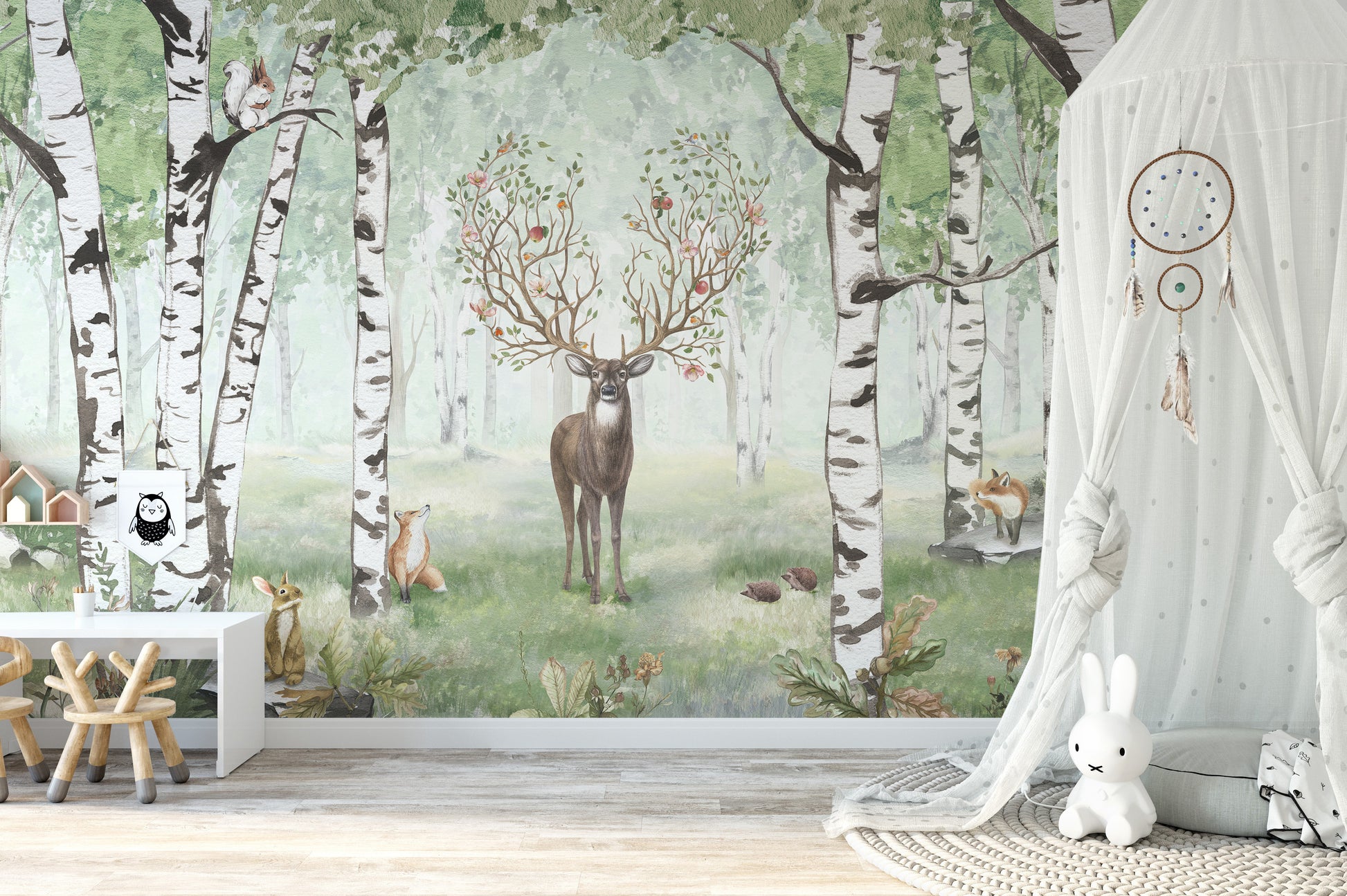 Floral-antlered deer in a serene watercolor summer forest.