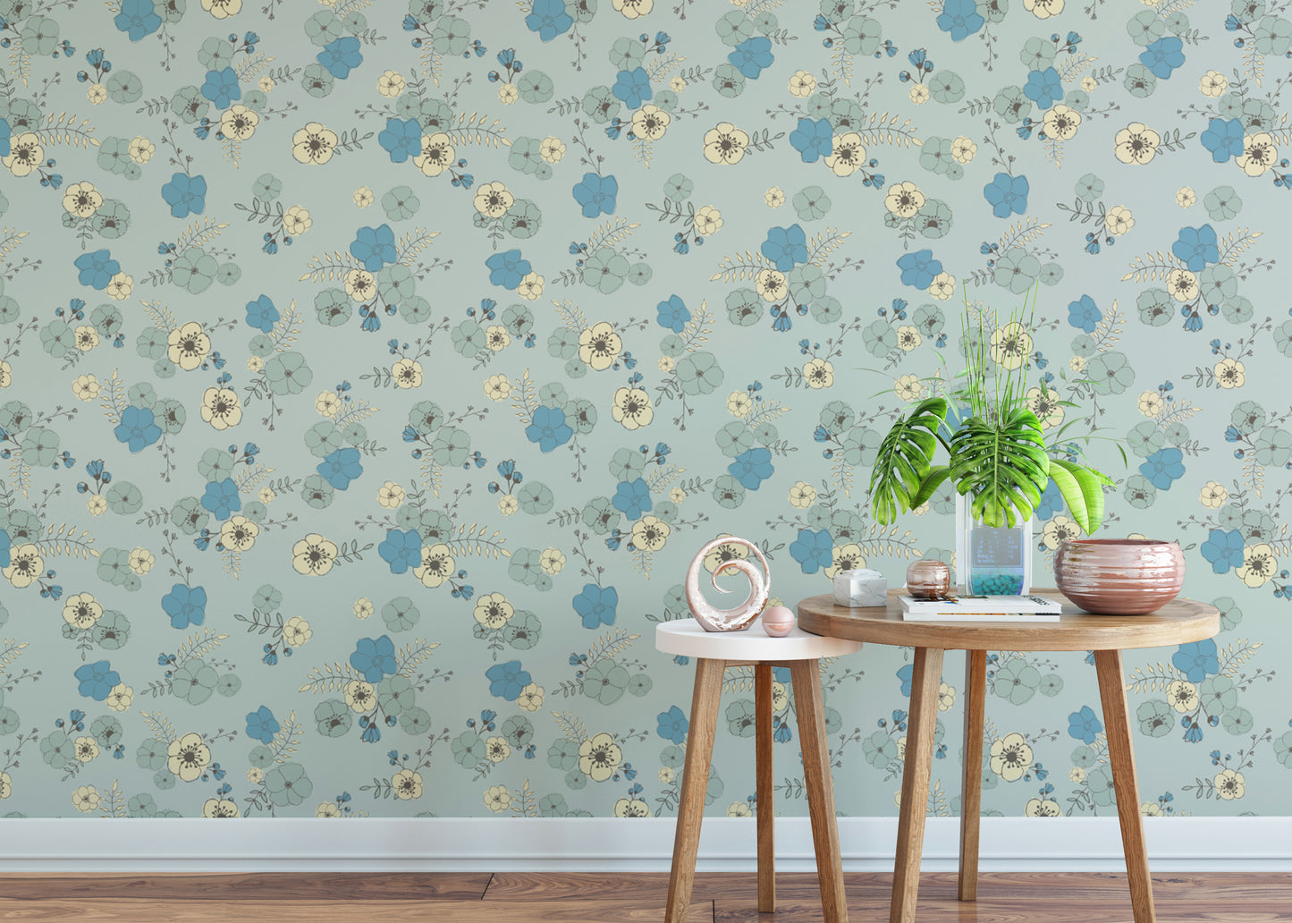 Sophisticated pastel blue wallpaper with scattered floral motifs.
