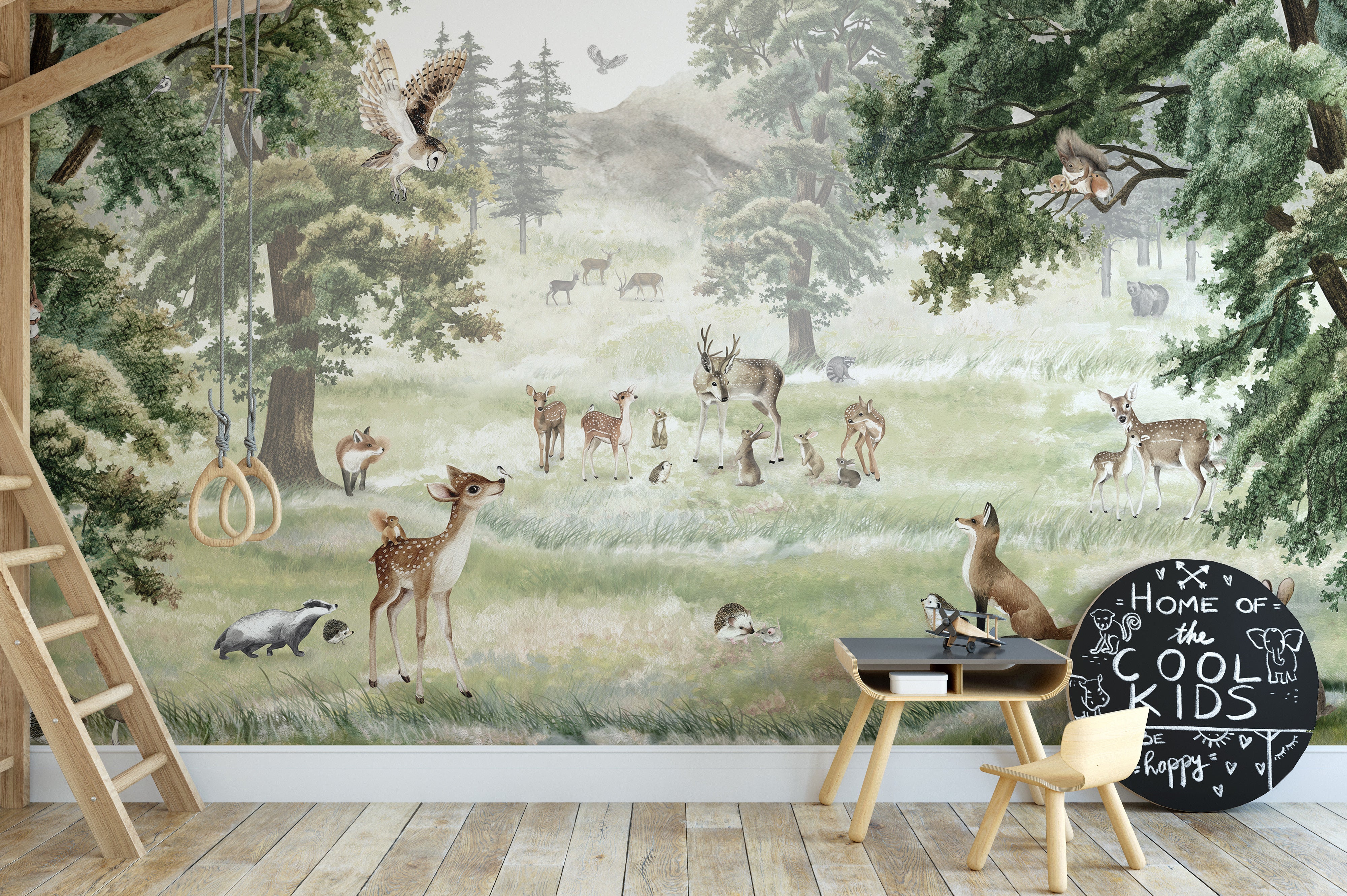 Fun forest-themed wallpaper with deer, rabbits, and trees