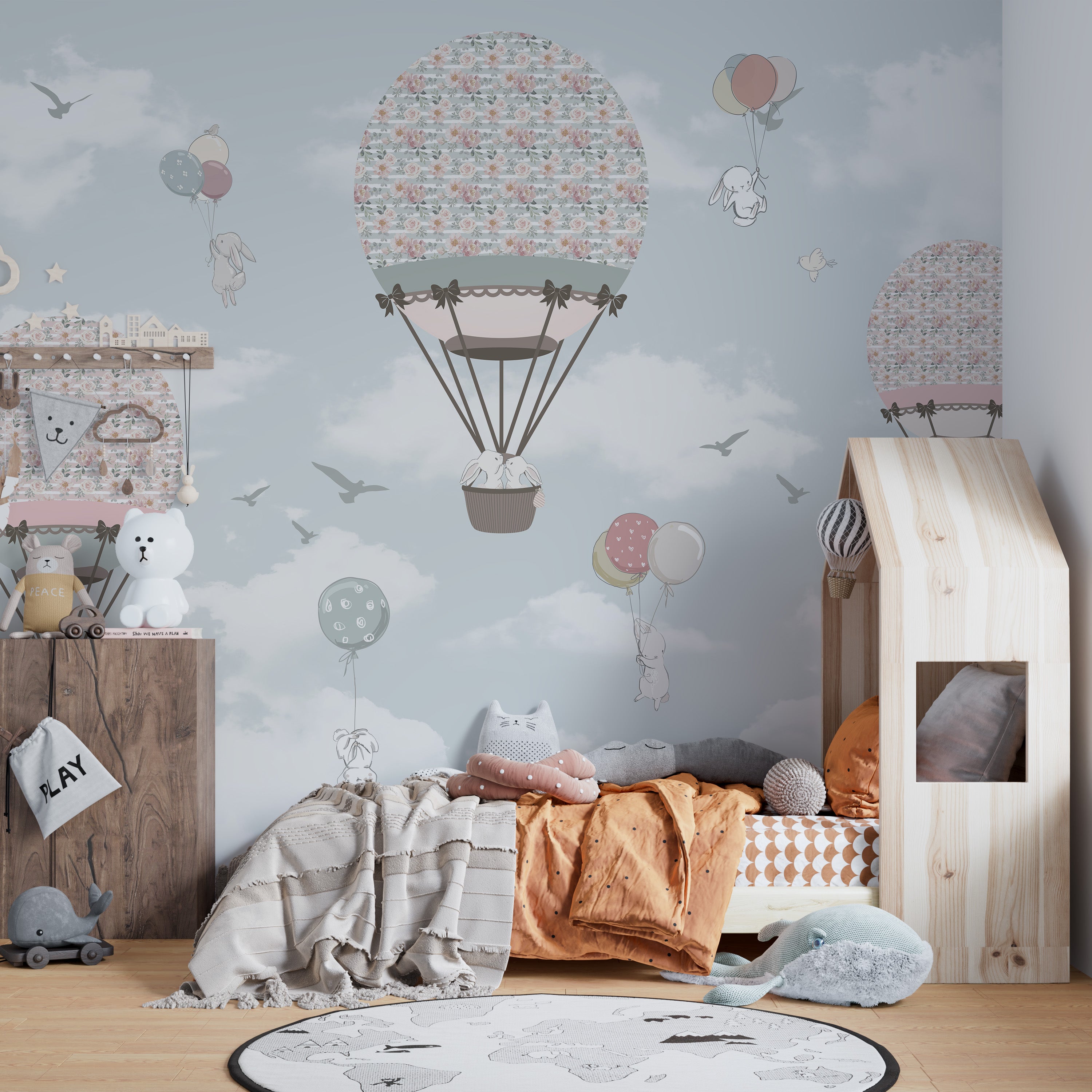 Sky-themed wallpaper mural with cute animals
