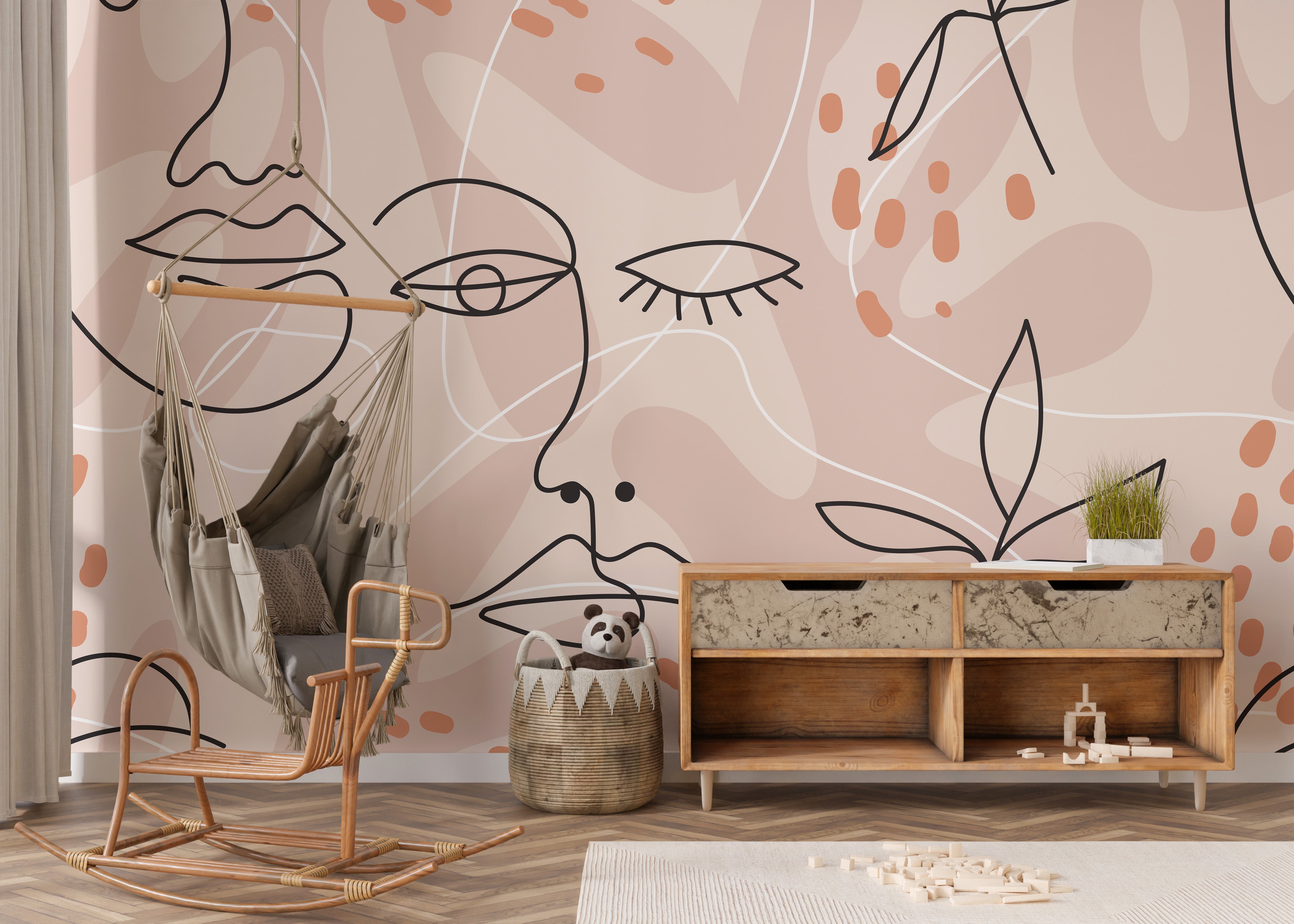 Pink wallpaper mural with human face line details
