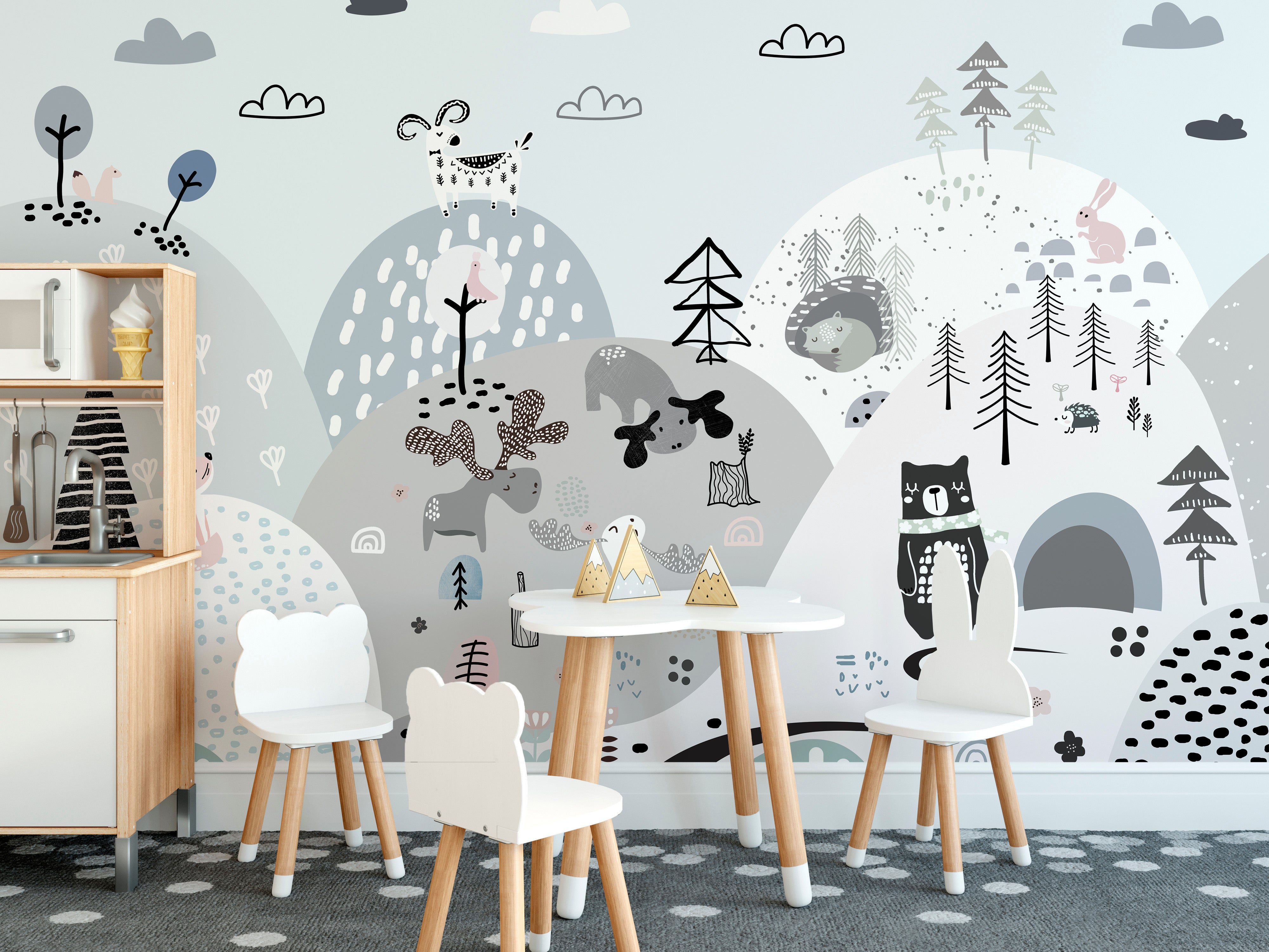 Playful woodland creatures on hills wallpaper mural.