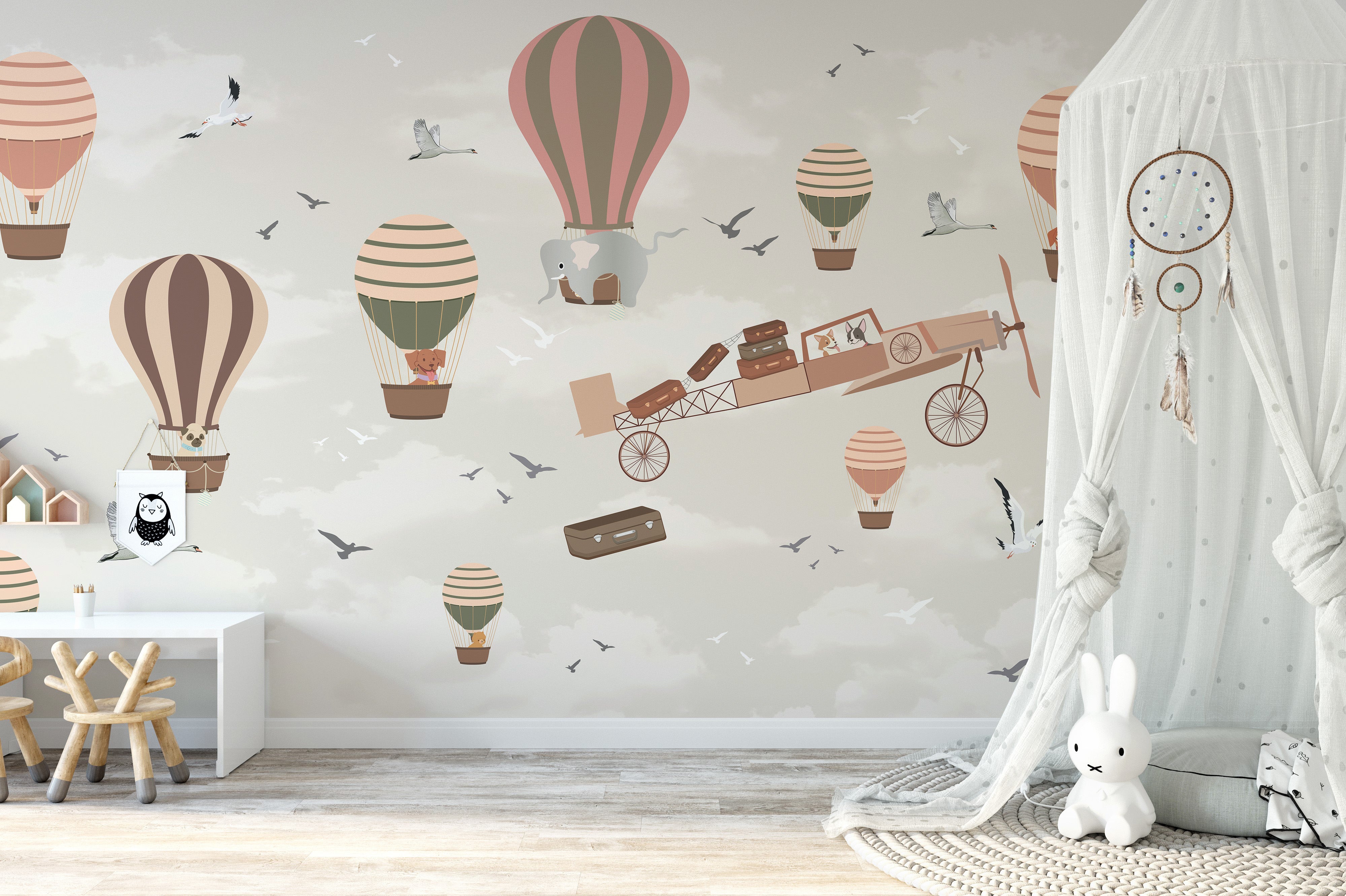 Colorful hot air balloon wallpaper with playful animals