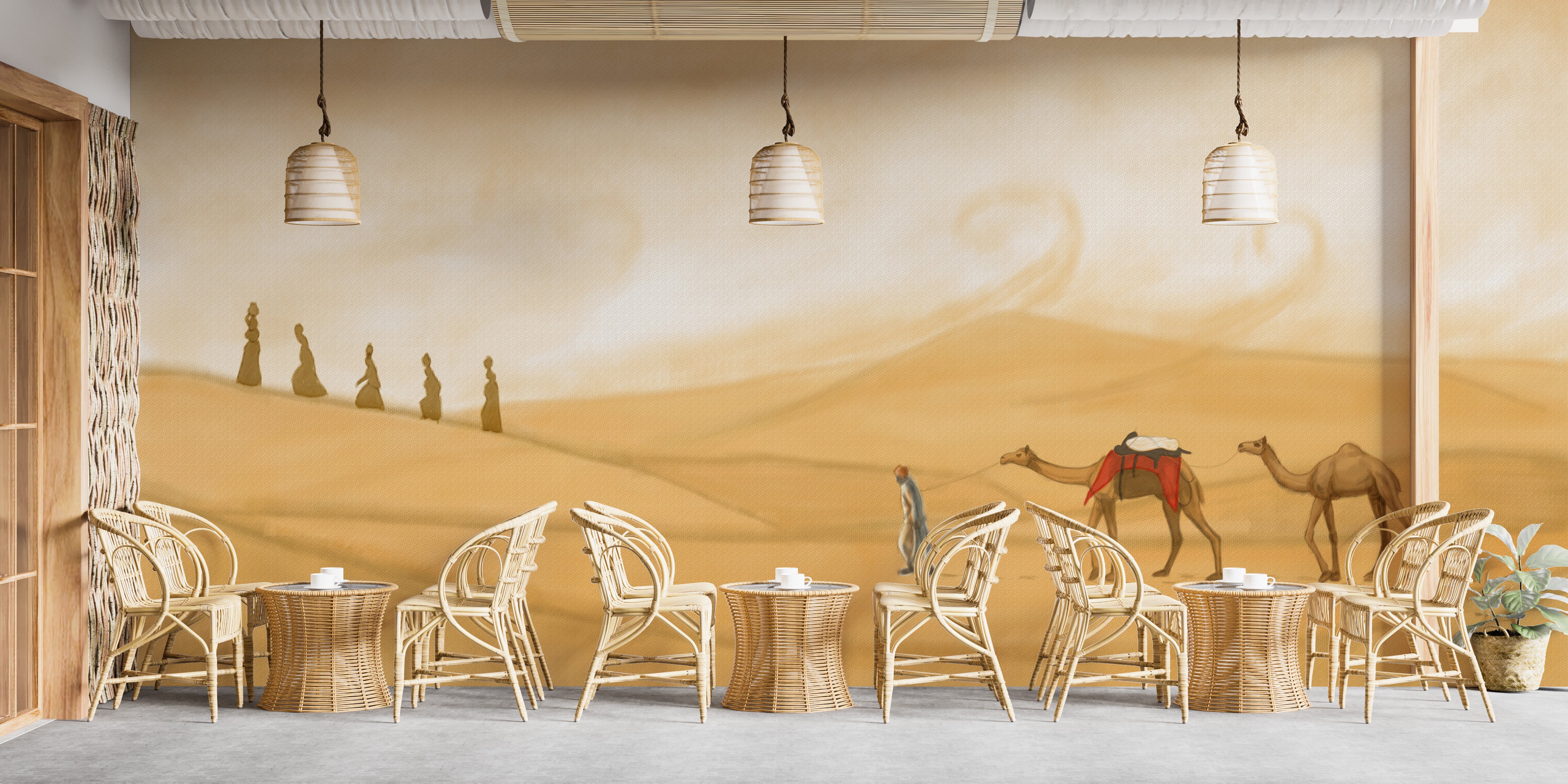 Scenic mural featuring camels in golden dunes