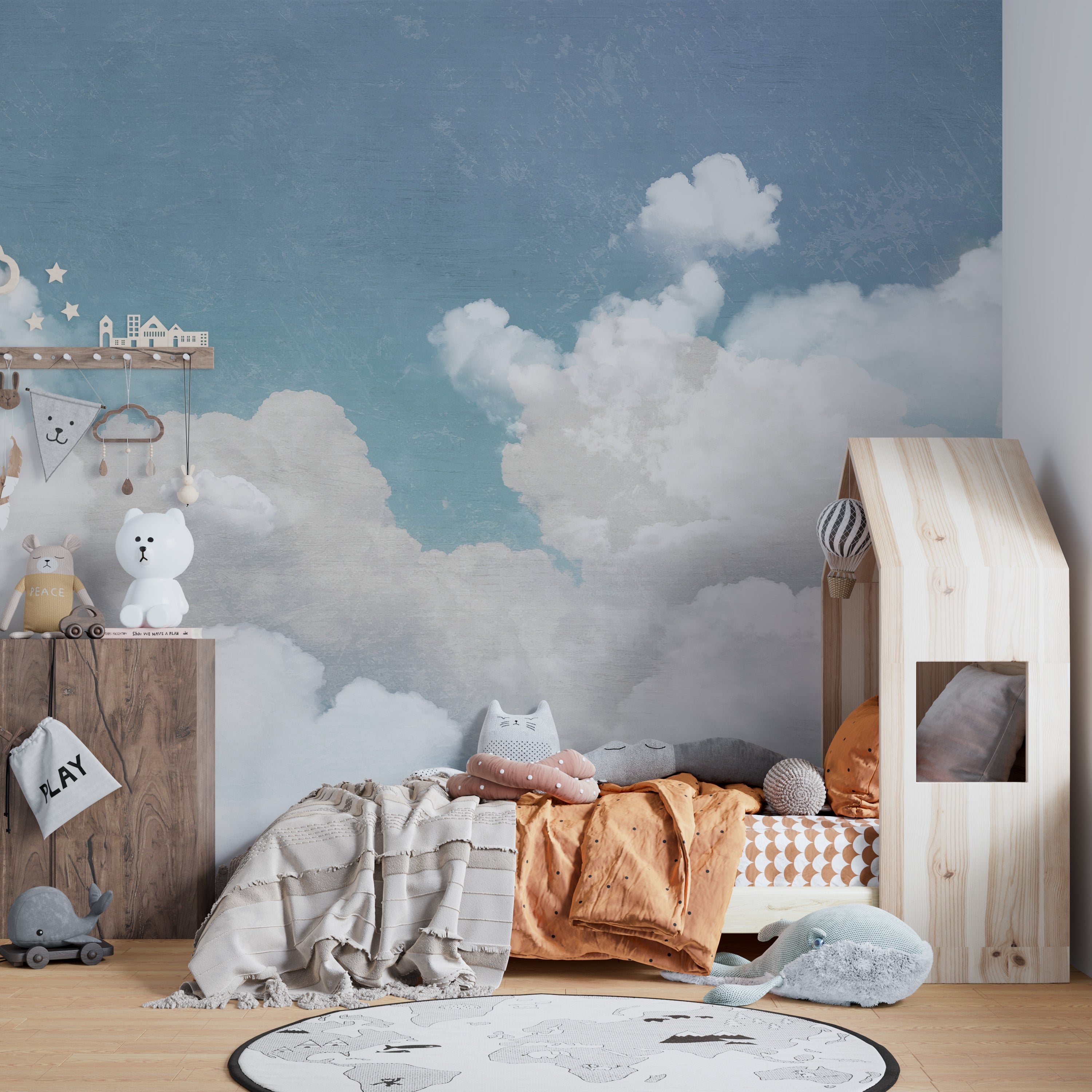 Sky blue mural with a dreamy cloudscape
