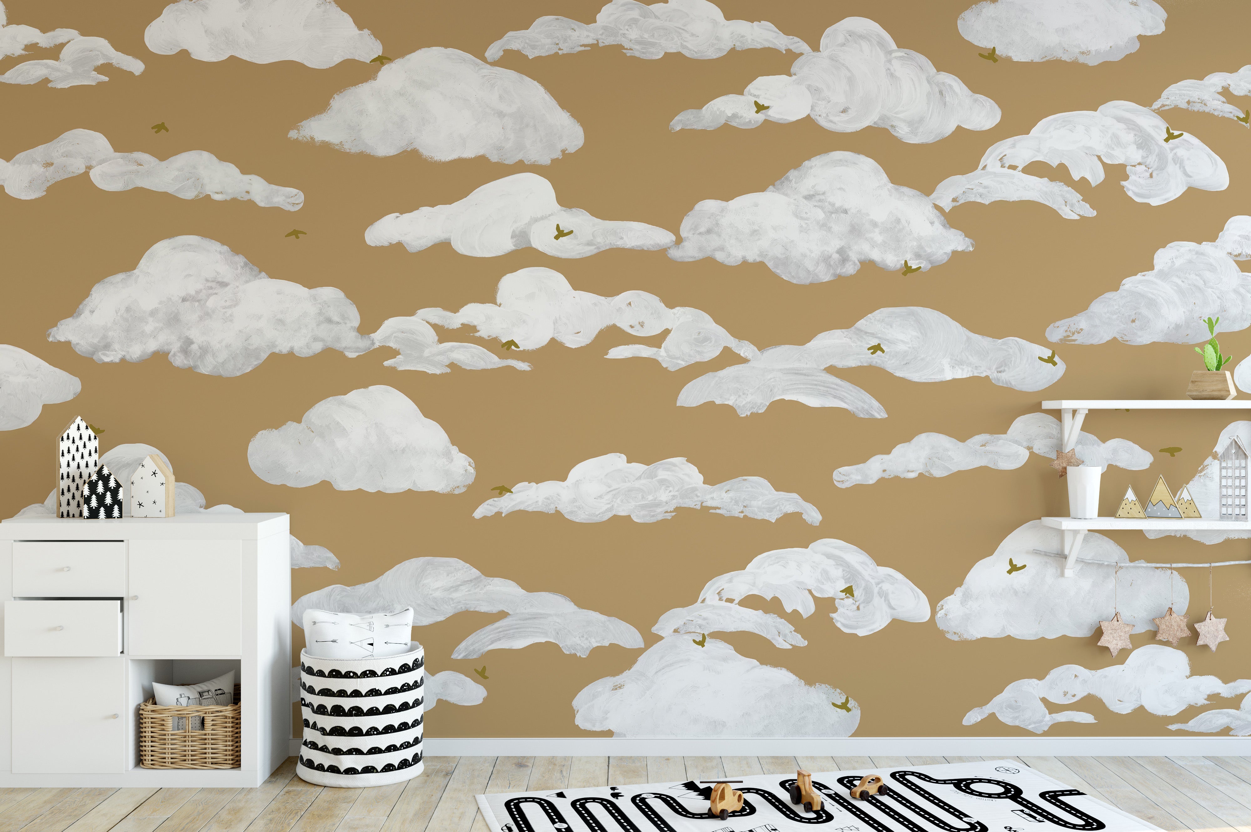 Fluffy clouds floating in golden sky wallpaper